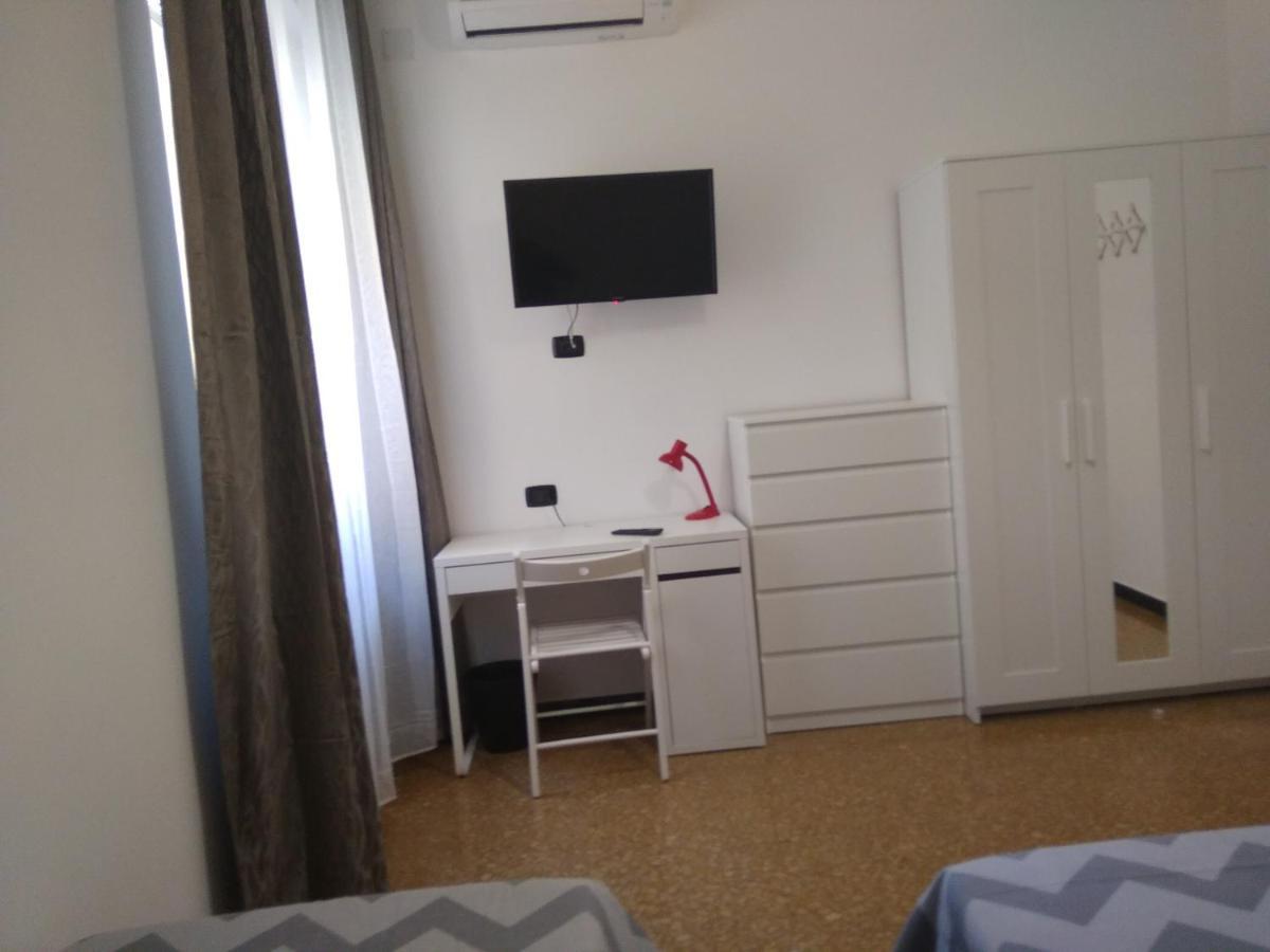 Camera Familiare con Bagno in Comune