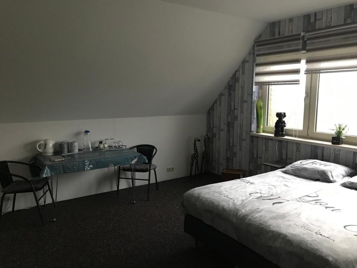 Kamer met Kingsize Bed en Uitzicht op Meer