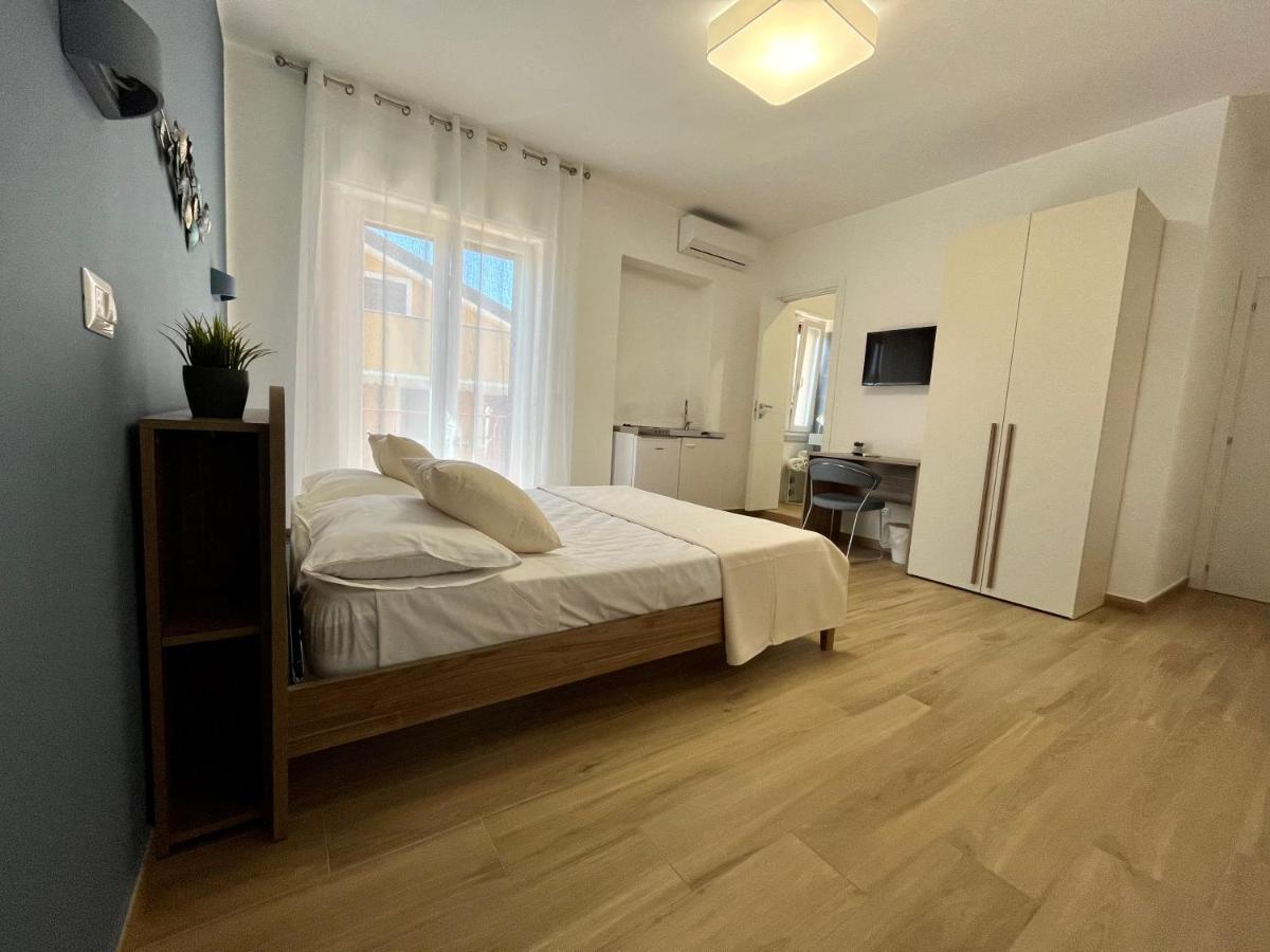 Camera Quadrupla Superior