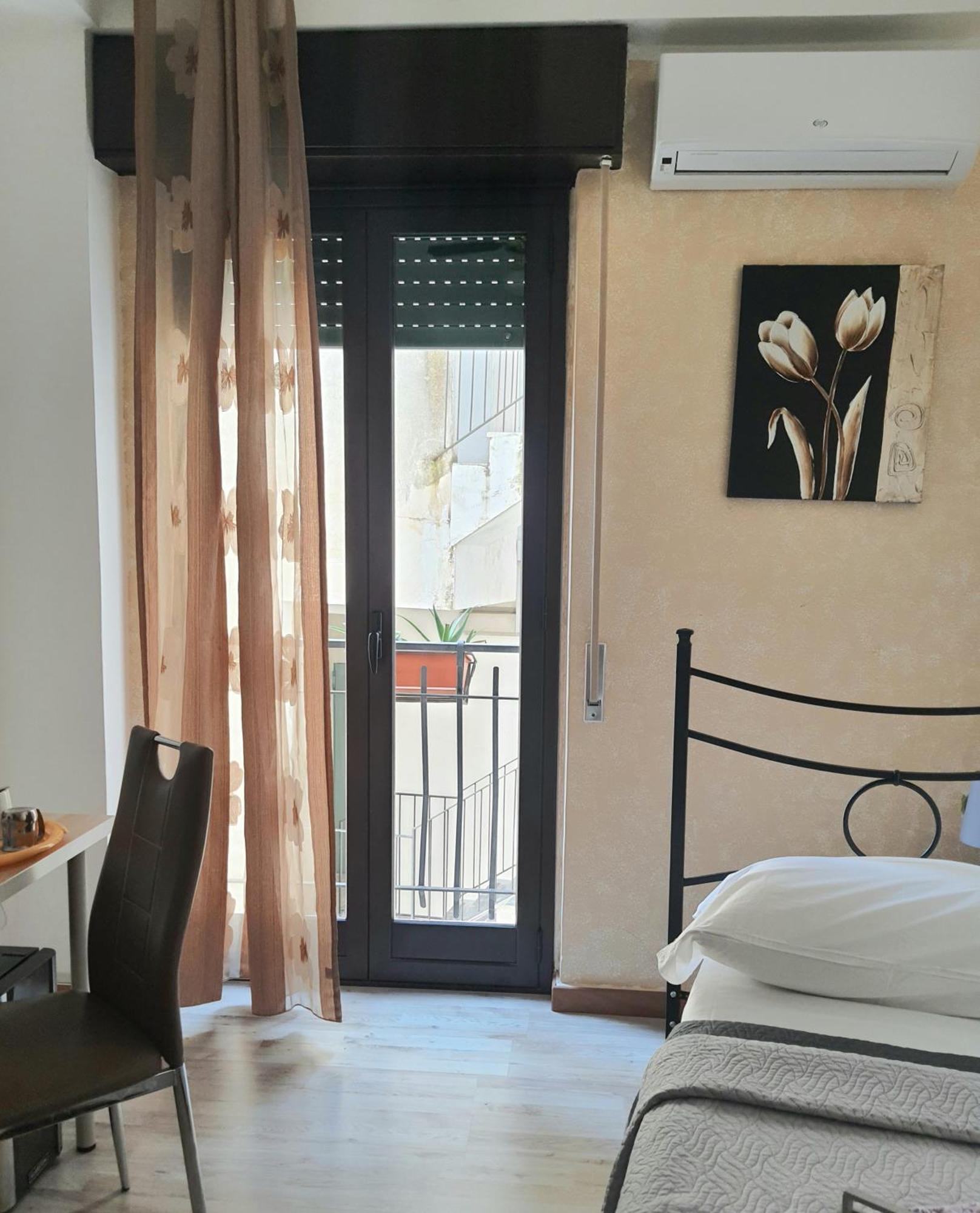 Camera Singola con Bagno Privato Esterno