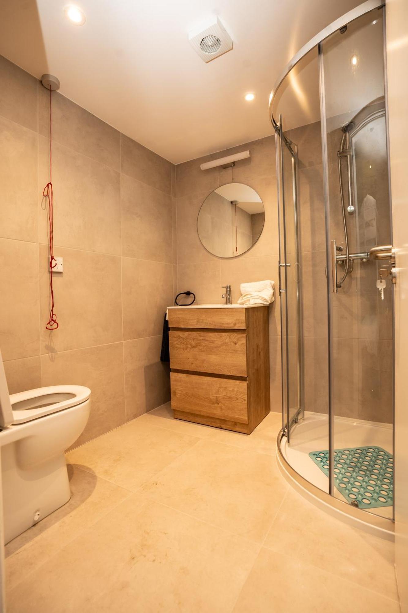Family Room Private Bathroom,1622647998:JPEG