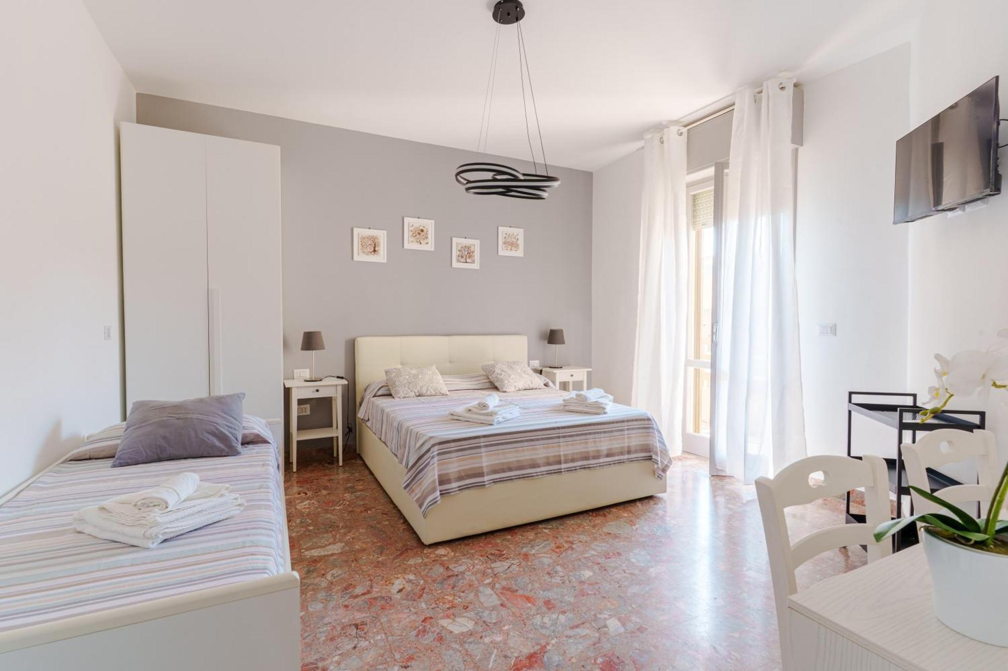 Camera Tripla con Balcone