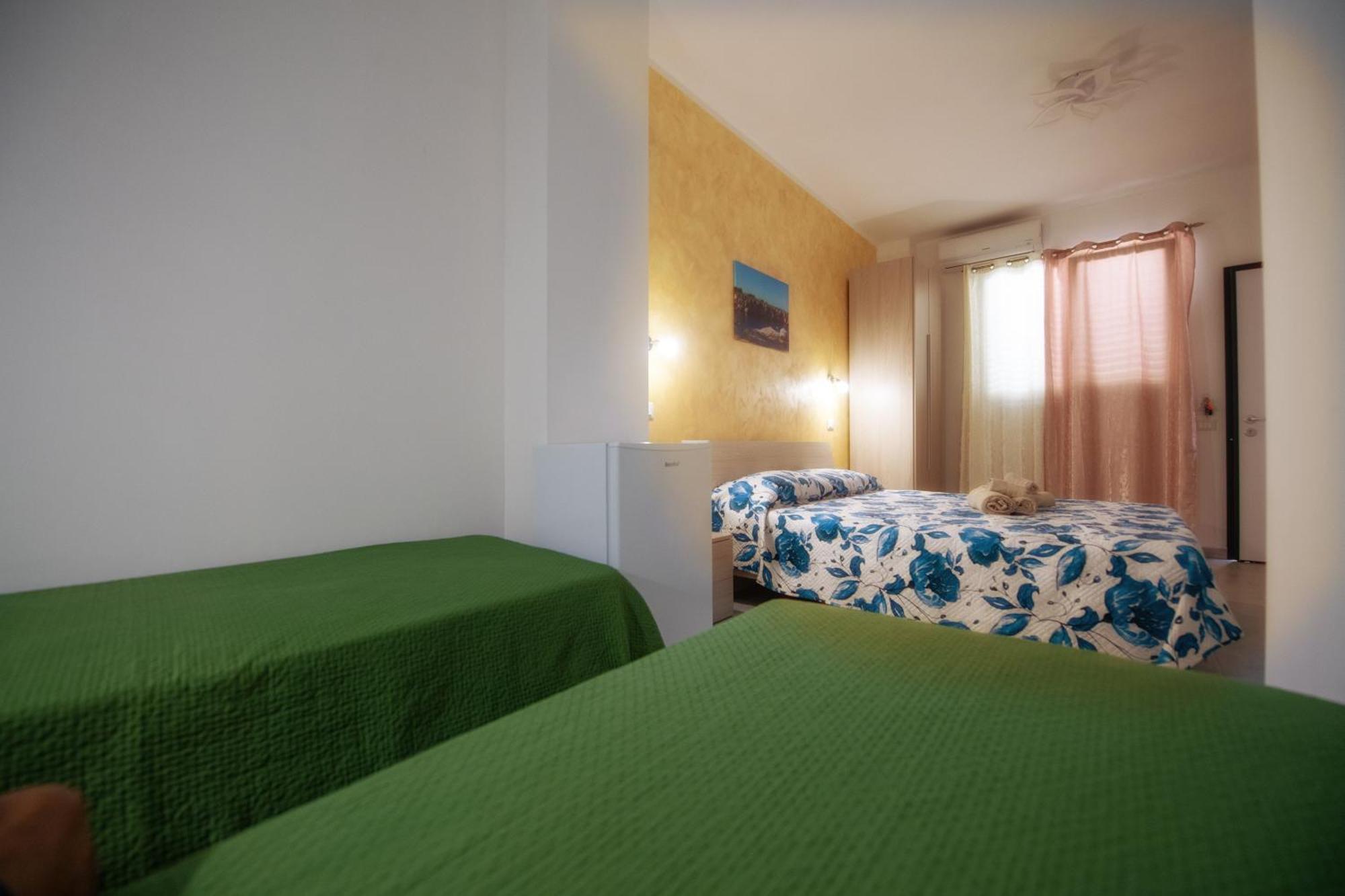 Chambre Quadruple avec Douche