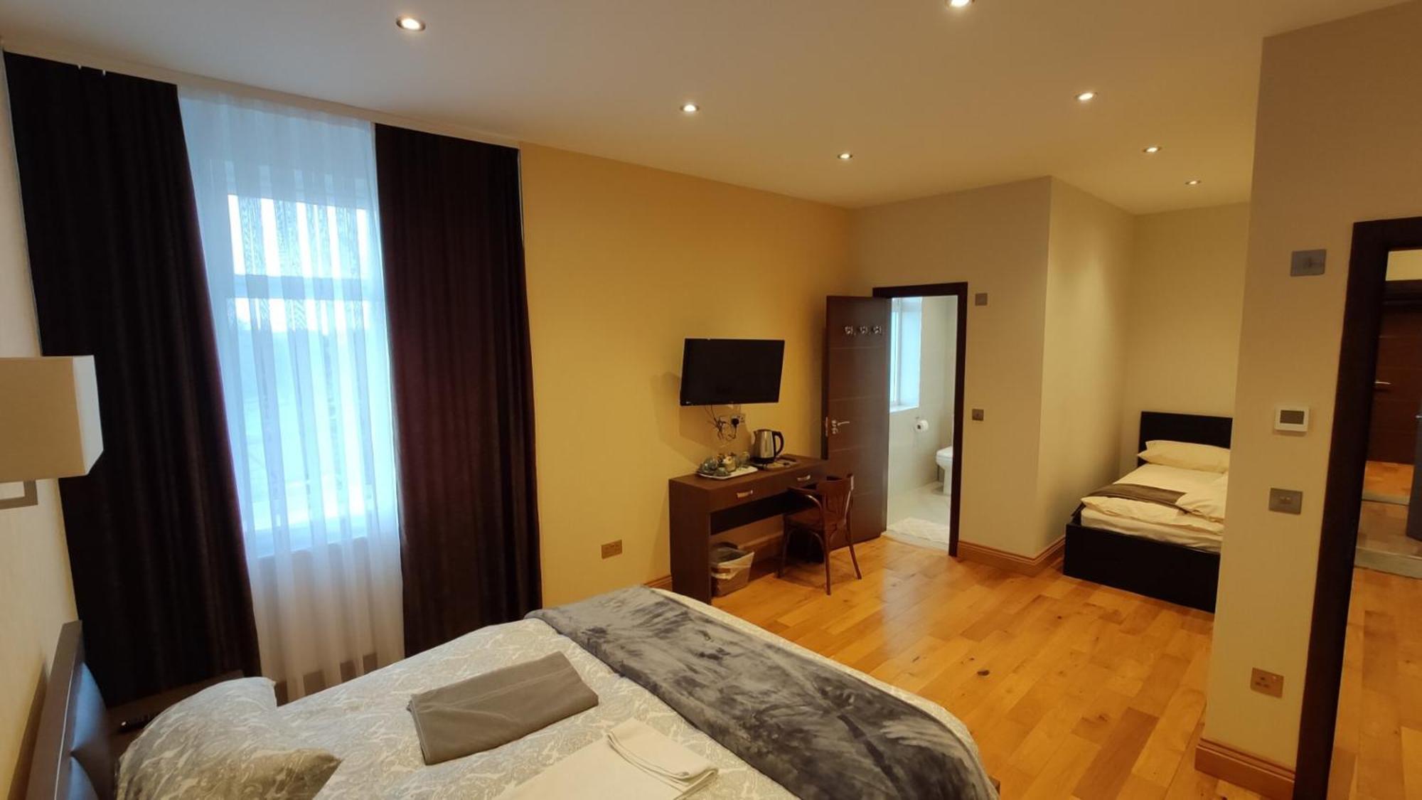 Deluxe Triple Room