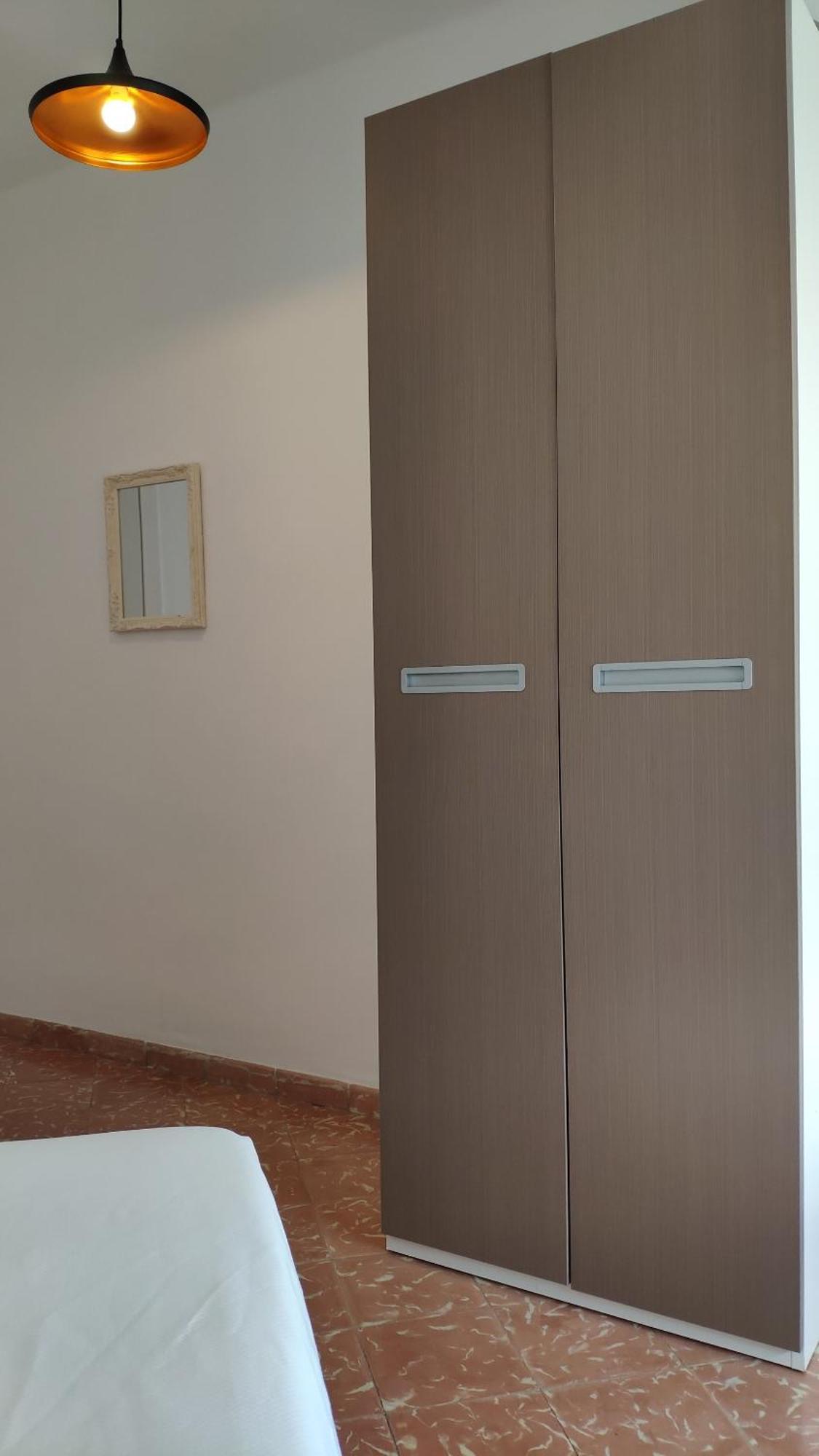 Camera Singola con Bagno in Comune