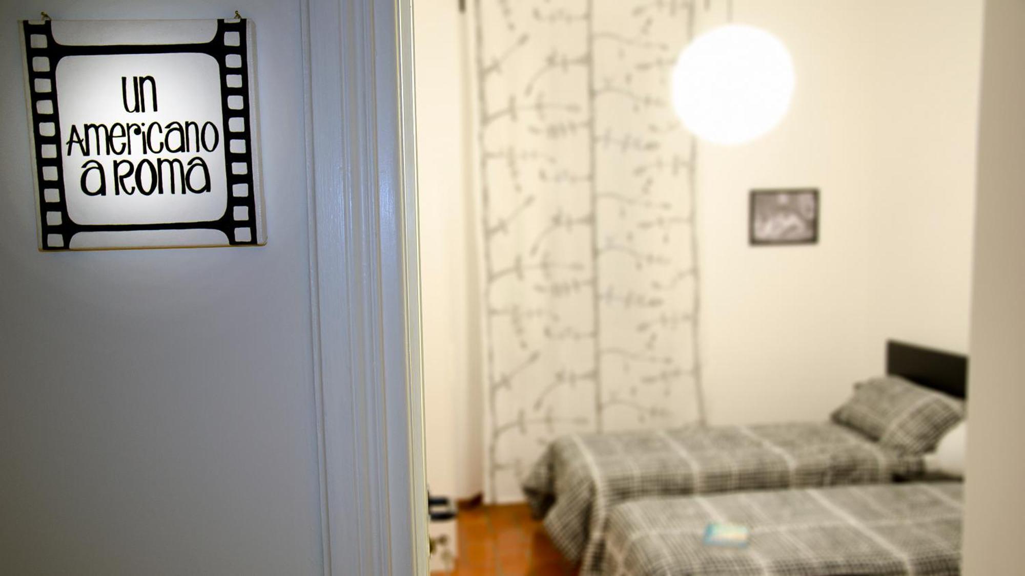 Camera Matrimoniale/Doppia con Letti Singoli con Bagno in Comune