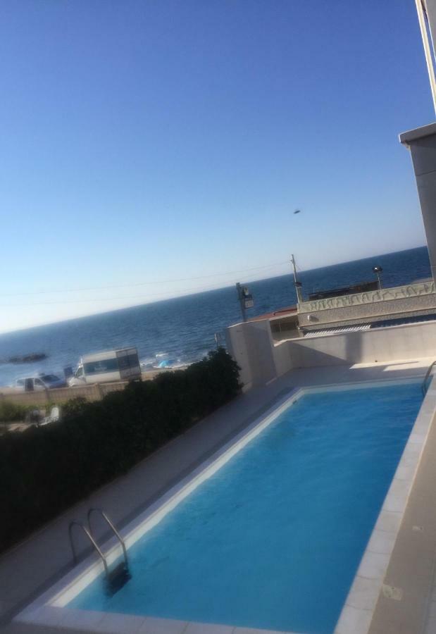 Camera Quadrupla con Balcone e Bagno Privato