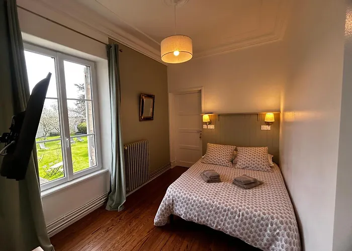 Les chambres d'Omaha Beach Etablissement avec deux chambres d'hôtes, petit-déjeuner compris fait-maison et produits locaux Vierville-sur-Mer