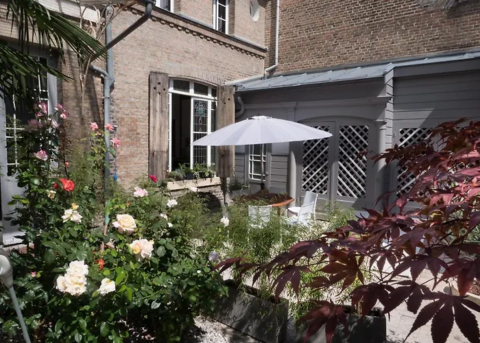 Maison En